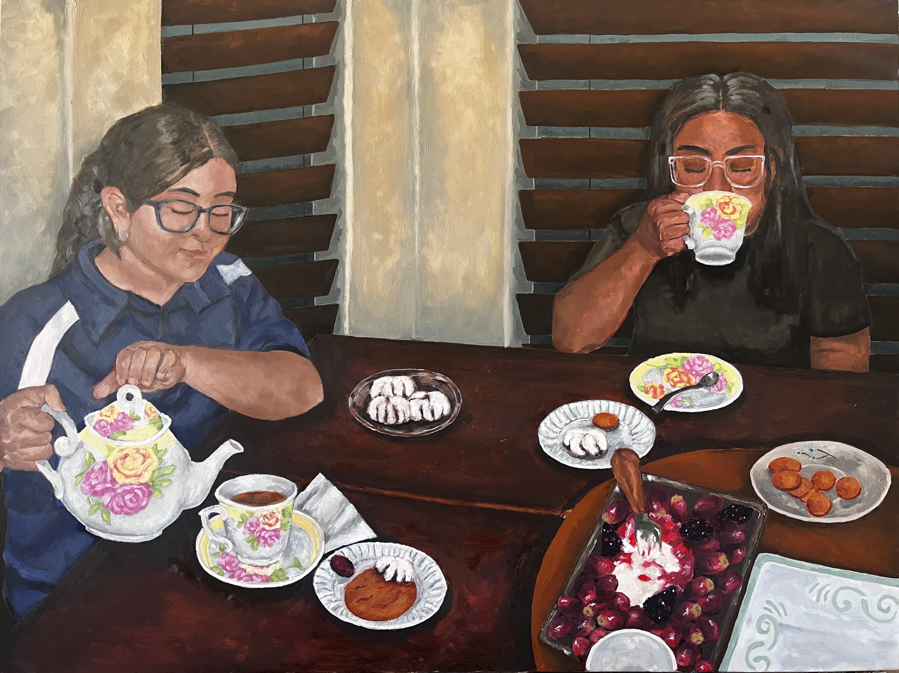 two girls are a table